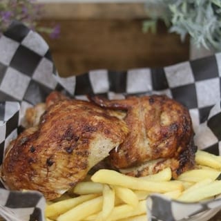 1/2 Rotisserie Chicken +2 Sides + 4 Sauce